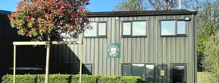 Picture shows Practicality Browns office in Iver with a large Photinia tree in the front.